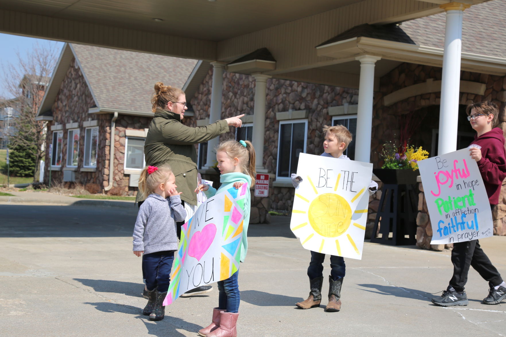 Kids with signs